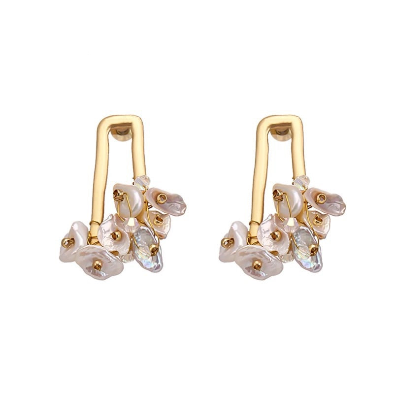 beautiful gold rectangular shape earrings embellished with tiny shell and crystal pendant pieces held together by gold wire 
